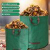 Green heavy duty waterproof foldable garden leaf bags filled with dry leaves, showing portable handle design for yard waste collection